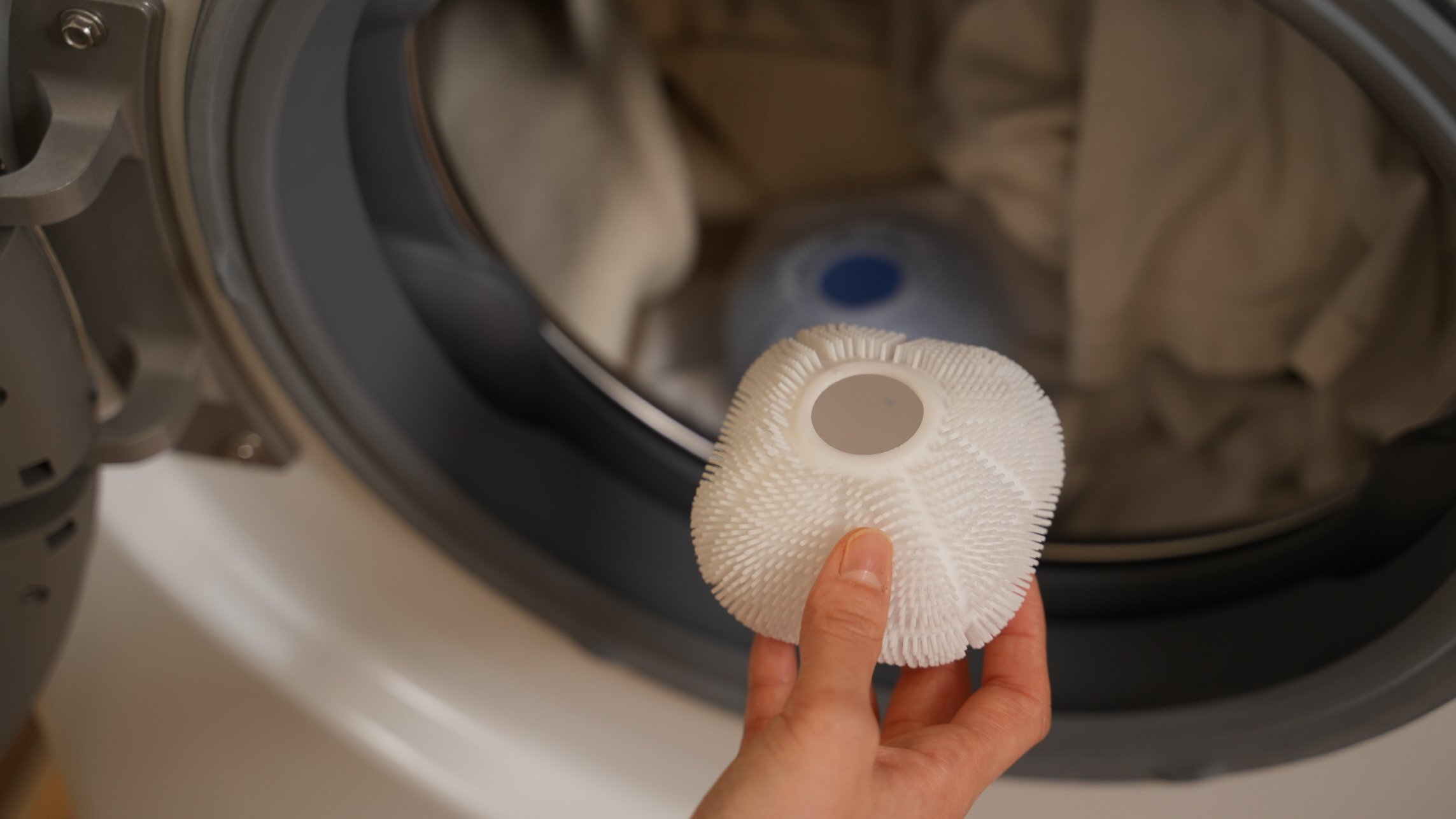 Dust still clinging after laundry? One-step wash & dry with the Laundry Ball that scrubs 2500 times
