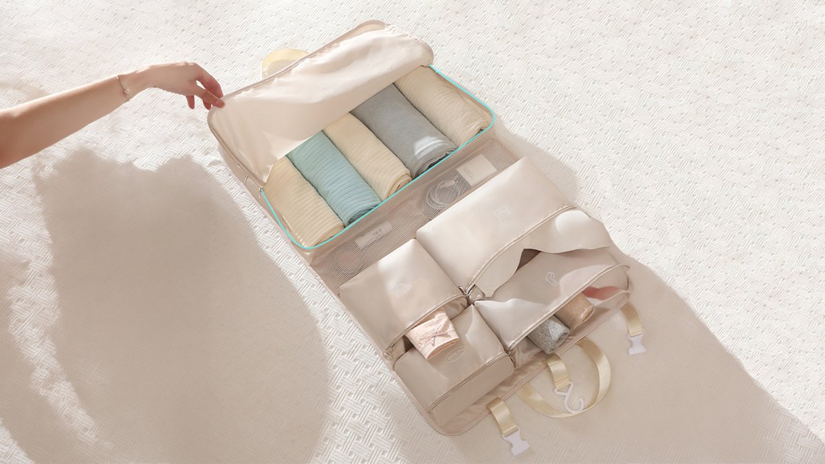 "Travel packing done in a snap." Spacious multi-compartment travel pouch!